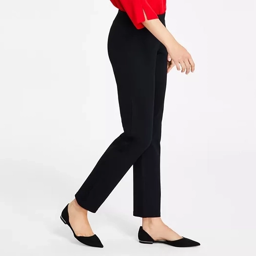 Black ankle-length pants paired with pointed-toe black flats and a red blouse.