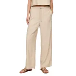Beige wide-leg linen pants with an elastic waistband and drawstring, paired with flat sandals.