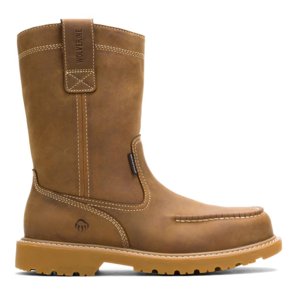 A tan leather pull-on work boot with a moc toe and lug sole, featuring reinforced stitching, a tab labeled \“Wolverine,\“ and a small claw logo embossed on the side.