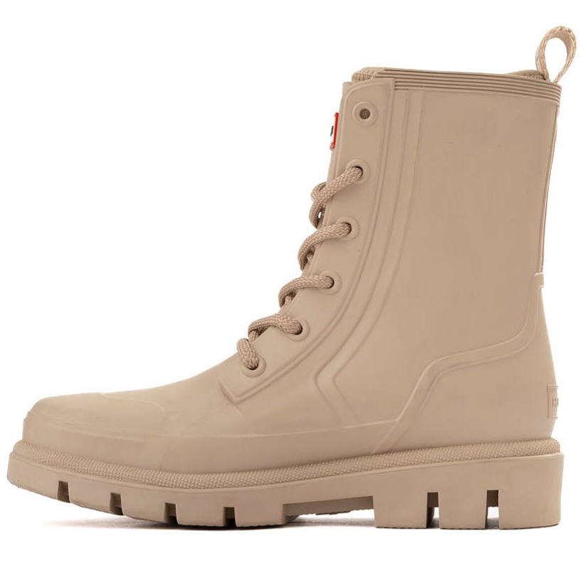 A beige lace-up rain boot with a rugged sole and a heel pull tab for easy wearing.