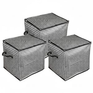 Three black and white houndstooth-patterned storage bags with handles, featuring zipper closures, are shown arranged together.