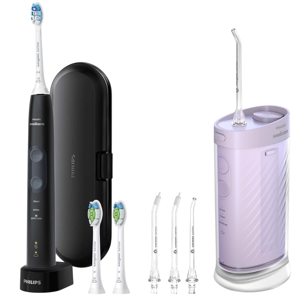 Philips Sonicare electric toothbrush with travel case and three brush heads beside a purple cordless water flosser and three additional nozzle attachments.