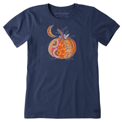 Navy blue T-shirt featuring a stylized orange pumpkin with decorative patterns and the message \“LIFE IS GOOD\“ printed near the collar.