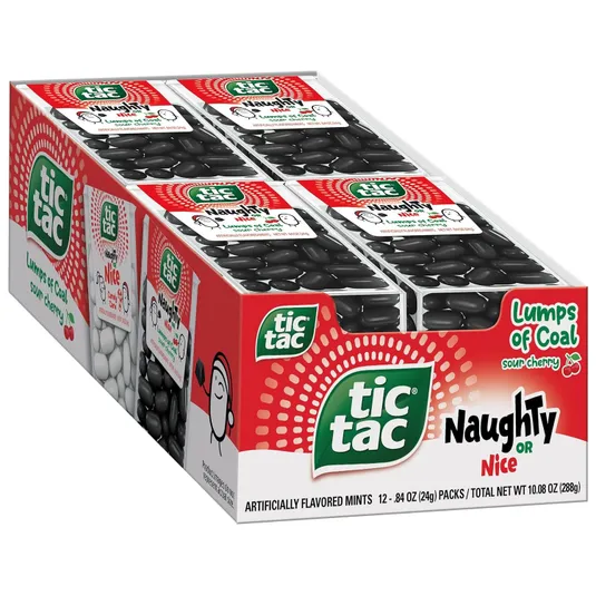 Twelve packs of Tic Tac mints with a \“Lumps of Coal\“ theme, featuring black, cherry-flavored mints and packaging with a festive, playful design.