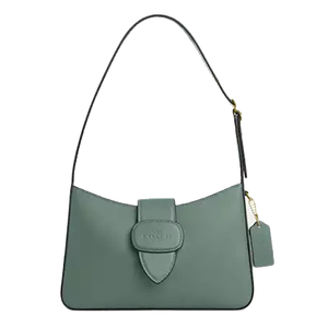 Coach Outlet Eliza Shoulder Bag in soft green features a sleek design with a flap closure, gold-tone hardware, and an adjustable shoulder strap. Includes a small hanging tag for added style.