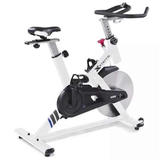 Xterra MB550 indoor cycling bike featuring adjustable seat and handlebars, flywheel, and pedals with straps for home exercise.