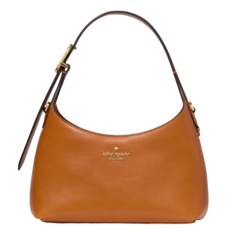 A tan Kate Spade handbag with a curved silhouette and a dark brown adjustable strap.