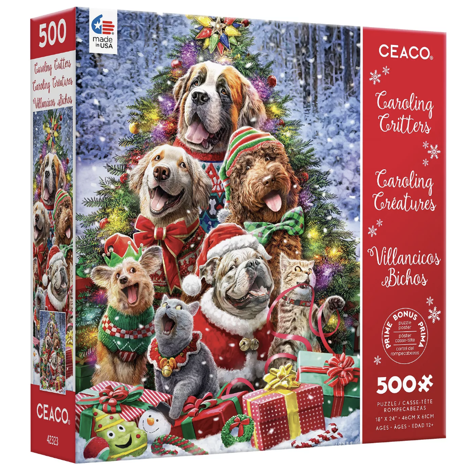 Ceaco 500-piece puzzle titled \“Caroling Critters\“ features festive dogs and a cat in holiday attire with gifts and a Christmas tree background. Vintage holiday theme, 18” x 24”.