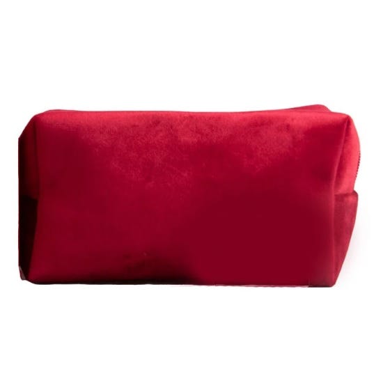 A rectangular makeup bag made of red velvet fabric. Its soft, smooth texture gives it a luxurious appearance.