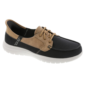 A casual loafer-style shoe with a black upper, tan accents, and white sole, featuring \“Skechers Slip-Ins\“ branding and lace-up design.