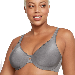 A woman is wearing a gray full-coverage bra with underwire support and a small front cutout detail.