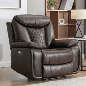 Brown leather recliner with diamond stitching, in a living room setting near a table and lamp.
