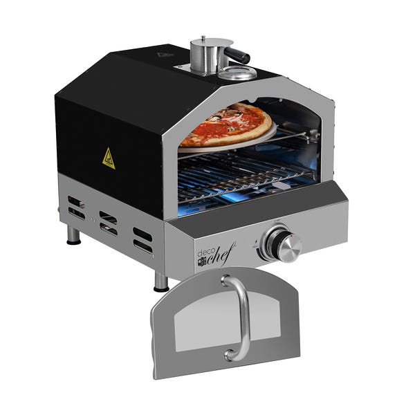 A small, portable outdoor pizza oven with a black and stainless steel design, featuring a removable front door, grill rack, and a visible cooking pizza.