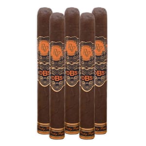 5-pack of Rocky Patel DBS cigars featuring a brown wrapper with decorative orange and black bands, showcasing the RP logo and \“DBS\“ text.