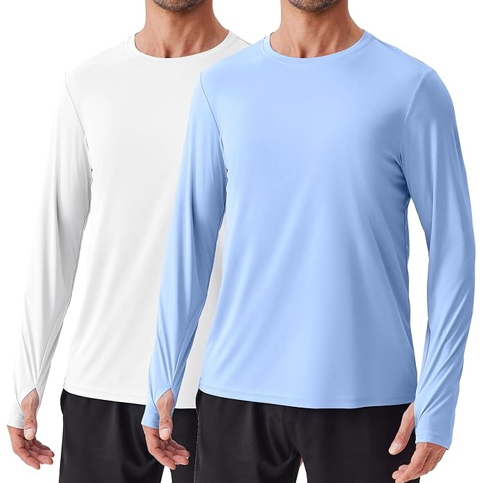Two men's long-sleeve shirts in white and light blue, designed for sun protection. They have a simple, crew-neck design and are paired with black shorts.
