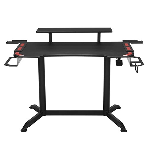 Gaming desk with a black surface, elevated monitor shelf, cup holder, headphone hook, and red accents on the edges.