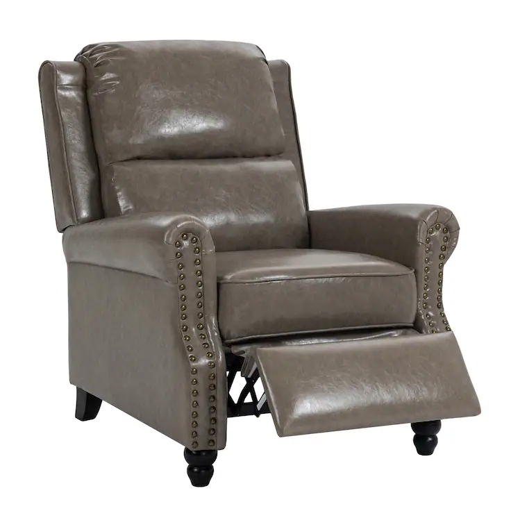 A gray leather recliner chair with nailhead trim, featuring a cushioned backrest and a footrest extended out, supported by dark wooden legs.