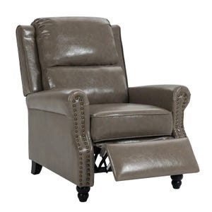 A gray leather recliner chair with nailhead trim, featuring a cushioned backrest and a footrest extended out, supported by dark wooden legs.