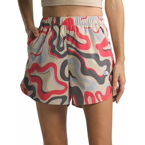 A pair of women's The North Face shorts with an abstract multicolored camouflage pattern.