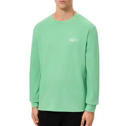 Mint green long-sleeve crew-neck shirt with a subtle waffle texture and a white embroidered logo on the chest, paired with black pants.