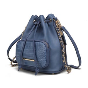 A blue drawstring bucket bag with a crocodile-textured front pocket, gold chain accents, and an adjustable shoulder strap.