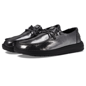 A pair of glossy black lace-up casual shoes with thick soles.