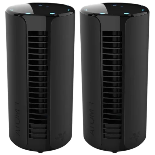 Two black cylindrical air purifiers with vent slits and touch controls on top.