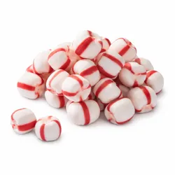 A pile of white and red-striped peppermint candies, showing their distinct cylindrical shape and color pattern.