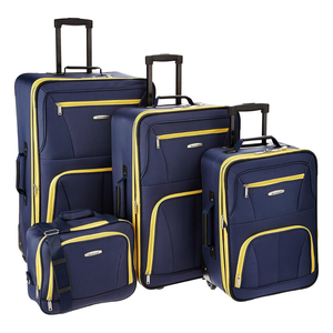 A set of four wheeled luggage pieces in navy with yellow accents, including three upright suitcases and one smaller carry-on bag.