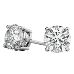 A pair of round diamond stud earrings set in white gold with four-prong settings, featuring a classic and elegant design.