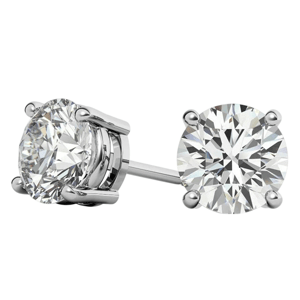 A pair of round diamond stud earrings set in white gold with four-prong settings, featuring a classic and elegant design.