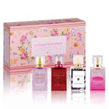 Catherine Malandrino fragrance gift set includes four perfumes in floral packaging: Violet Gem, Style de Paris, Transcendent, and Romance de Provence.