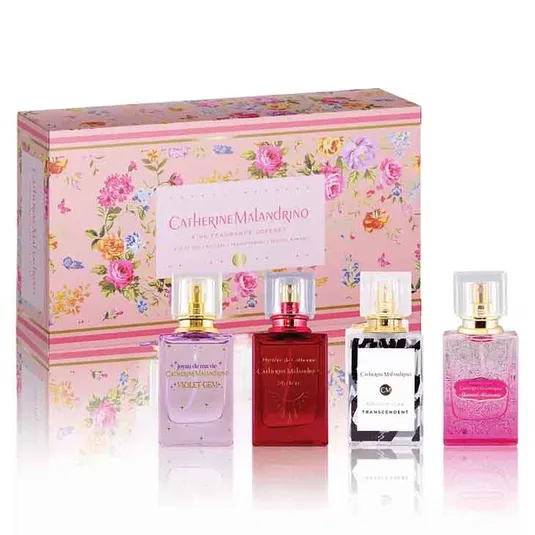 Catherine Malandrino fragrance gift set includes four perfumes in floral packaging: Violet Gem, Style de Paris, Transcendent, and Romance de Provence.