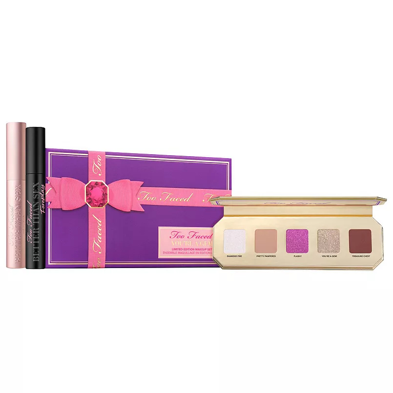 Too Faced You're a Gem Eye Makeup Set includes a purple gift box, an eyeshadow palette with five shades (Diamond Fire, Pretty Impressive, Flashy!, You're a Gem, Treasure Chest), and two mascaras.