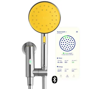 A smart showerhead with a yellow face and silver body, featuring Bluetooth connectivity and an app interface displaying water usage, savings, and energy stats.