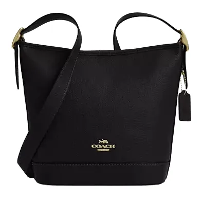 A black Coach crossbody bag with gold hardware, featuring a minimalist design, leather texture, and an adjustable strap.