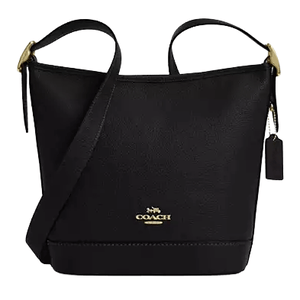 A black Coach crossbody bag with gold hardware, featuring a minimalist design, leather texture, and an adjustable strap.