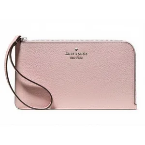 A pink Kate Spade New York wristlet with a textured leather finish, featuring a zippered closure and a strap for easy carrying.