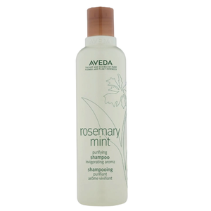 Aveda Rosemary Mint Shampoo is a purifying shampoo with an invigorating aroma, featuring botanical and plant essences. It's designed for cleansing and refreshing the hair.