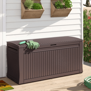 A large brown outdoor storage bench on a porch with two wooden planters on the wall above it.