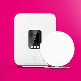 A white Wi-Fi router with a digital display showing connection status and a separate circular device, both featuring a logo, set against a pink background.
