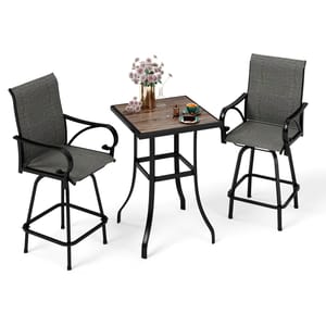 Outdoor bar set with a square table and two high chairs, featuring a gray fabric and black metal design. The table is decorated with a flower vase, coffee cup, and saucer.