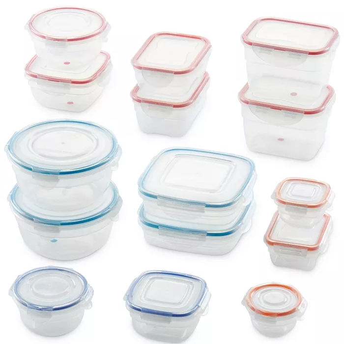 A 30-piece Lock n Lock food storage set with various sizes and shapes of transparent containers featuring red and blue airtight lids.