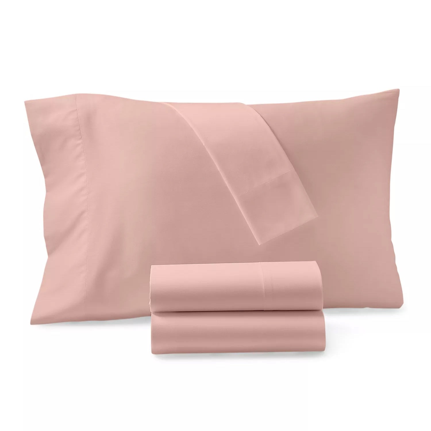 A set of pink bed linens, featuring a folded sheet and pillowcase, with additional sheets rolled in front.