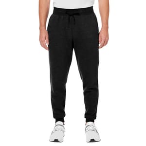 A person wearing black jogger sweatpants paired with white athletic shoes and a white shirt.