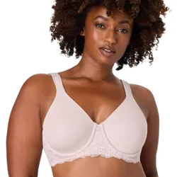 A woman is wearing a light-colored bra with underwire support and lace detailing at the band.