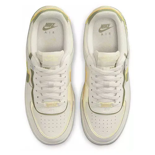 A pair of white Nike Air Force 1 sneakers with yellow accents, viewed from the top.