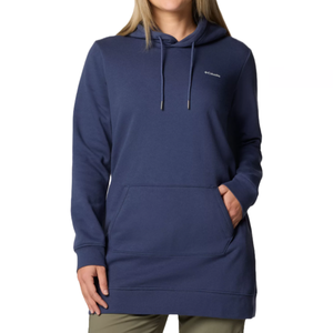 A woman is wearing a blue hooded sweatshirt with a kangaroo pocket and a small logo on the chest.