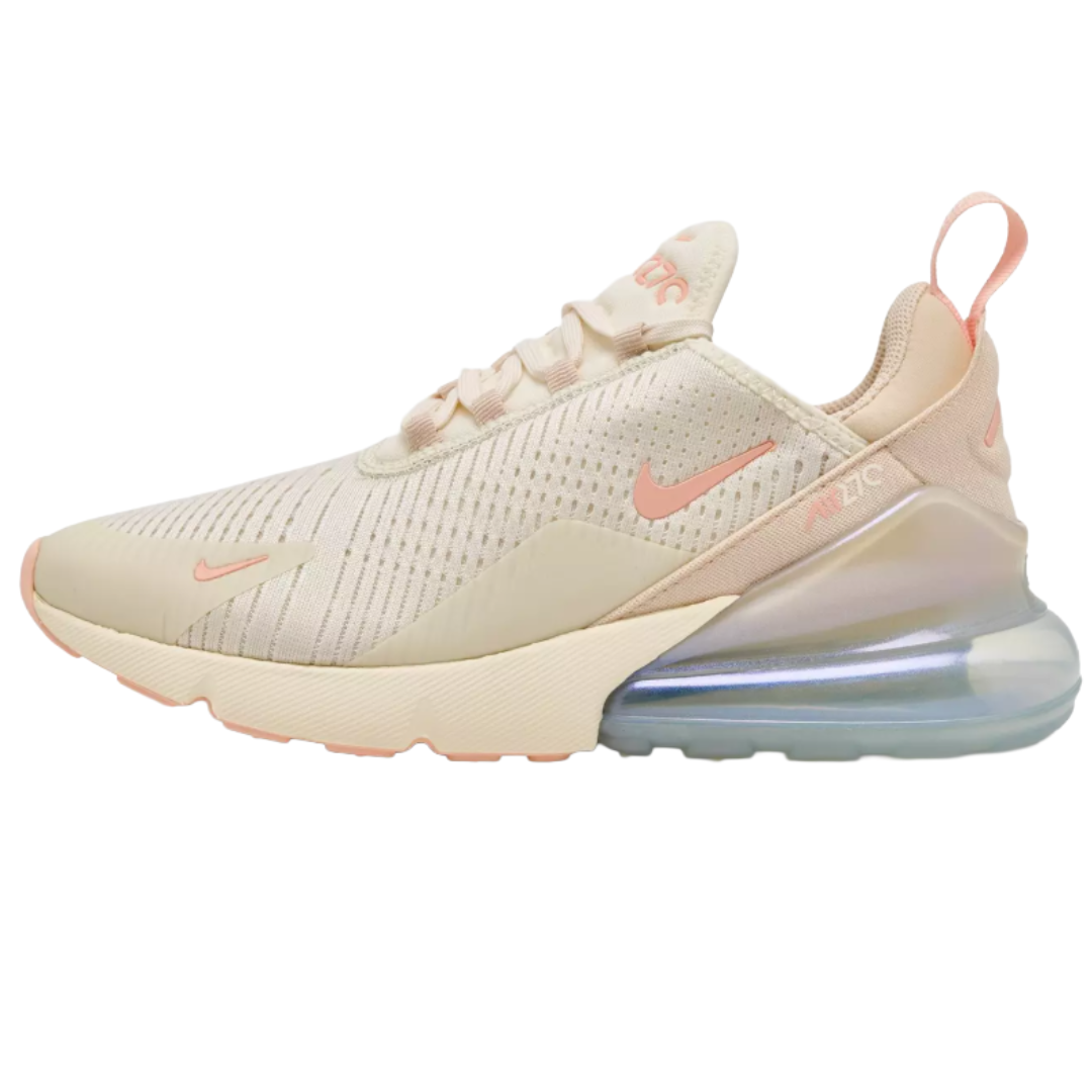 Nike Air Max 270 sneaker in a light beige color with pink accents and a translucent air unit in the heel.