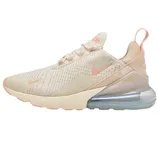 Nike Air Max 270 sneaker in a light beige color with pink accents and a translucent air unit in the heel.